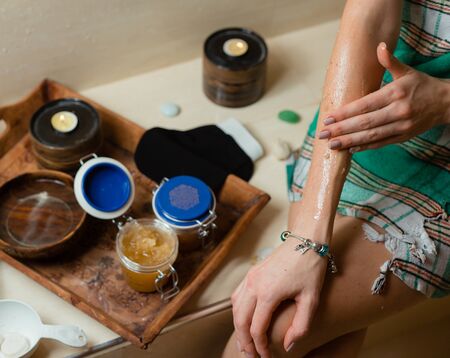 fresh honey is used for treatment by womanの写真素材