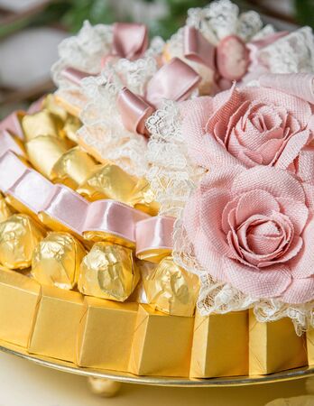 tray of chocolates for traditional khoncha decorated with artificial flowersの写真素材