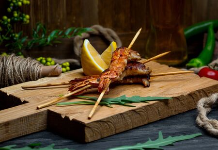 fried prawns on wooden boardの写真素材