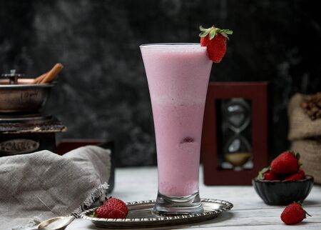 strawberry milkshake on the table