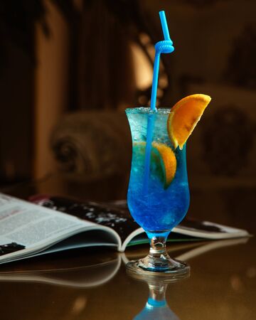 blue azzurre cocktail on the tableの写真素材