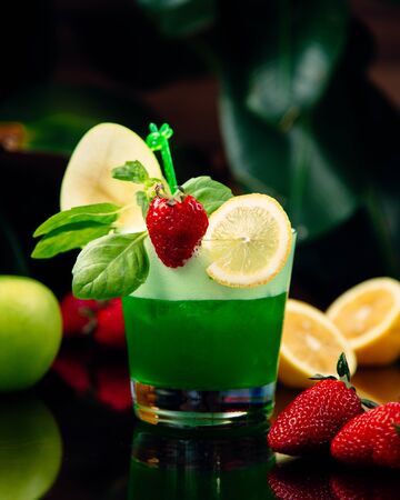 fresh apple juice with lemon and strawberryの写真素材
