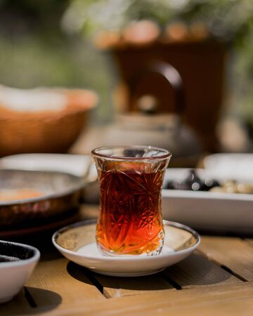 hot black tea in armudu glassの写真素材