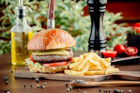 classic meat burger with french friesの写真素材