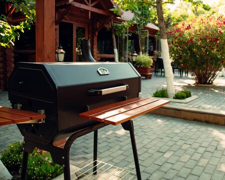 portable bbq stand in the restaurant gardenの写真素材