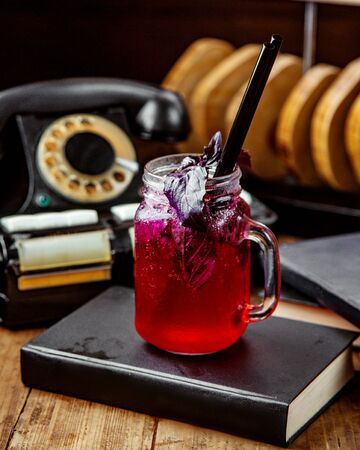 homemade ice tea with basil leavesの写真素材