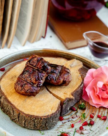 fried meat with crispy crust on a wooden hempの写真素材