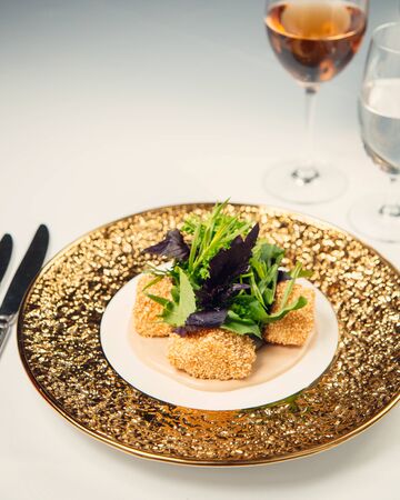 nuggets with greenery on topの写真素材