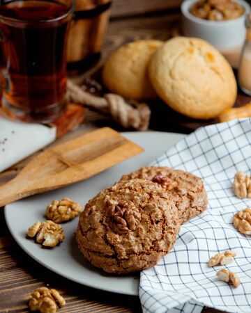 whole grain cookies with walnut on topの写真素材