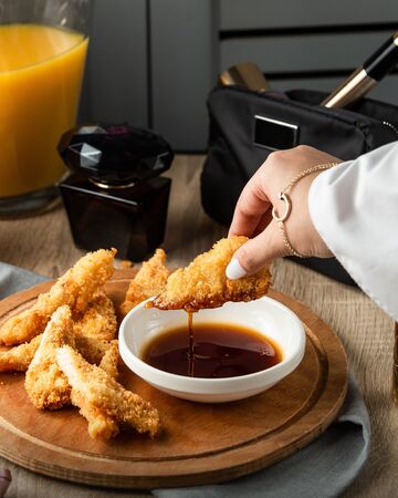 fried crispy fish with narsharab sauceの写真素材