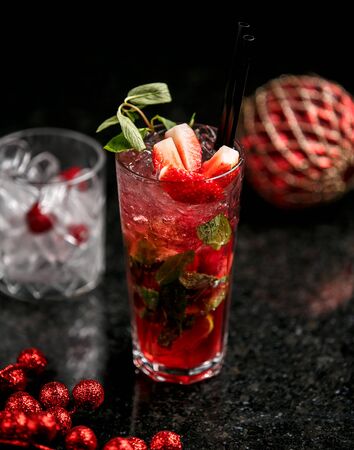 strawberry mojito with ice on the tableの写真素材