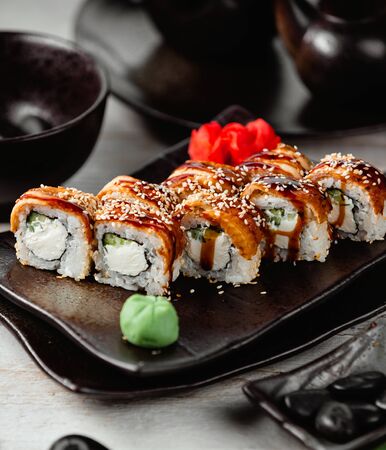 sushi set with white cream and sauceの写真素材