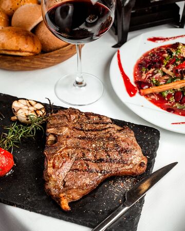 fried piece of steak on the tableの写真素材
