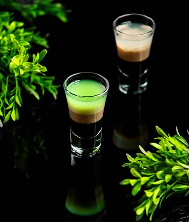 small drink shots on the tableの写真素材