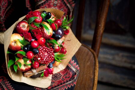bouquet with various fruits and flowersの写真素材