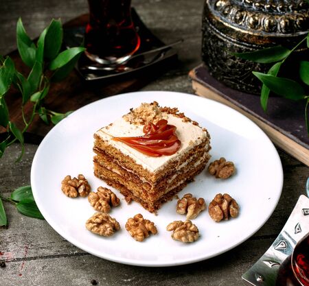 dessert with caramel cream and walnutsの写真素材