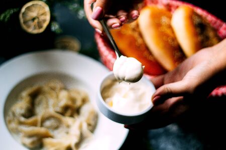 dumplings topped with sour creamの写真素材