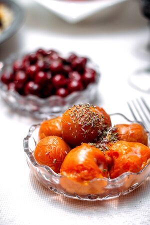 fruits and berries served in glass plateの写真素材