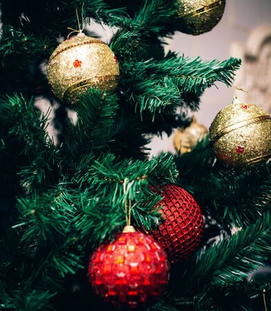 new year tree with toys on topの写真素材