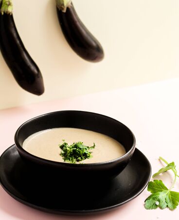 mushroom soup and eggplant on topの写真素材