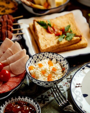 rice with toasts and ham slicesの写真素材