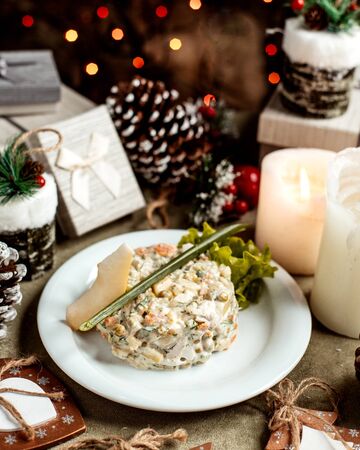russian salad with slice of cheeseの写真素材