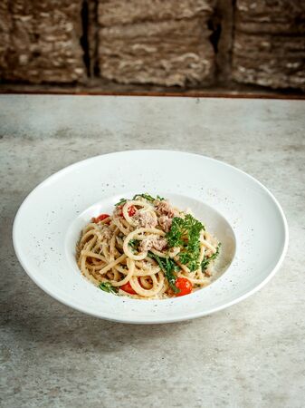 spaghetti with tomato and cheeseの写真素材