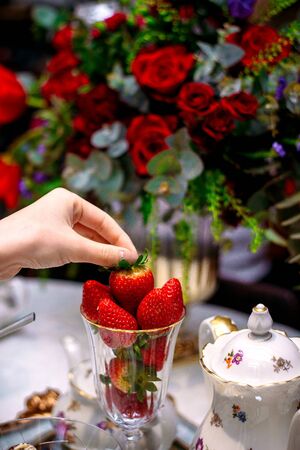 strawberries served in glassの写真素材
