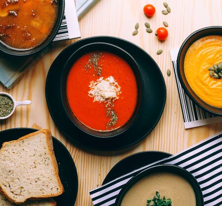 tomato soup with dried herbs and cheeseの写真素材
