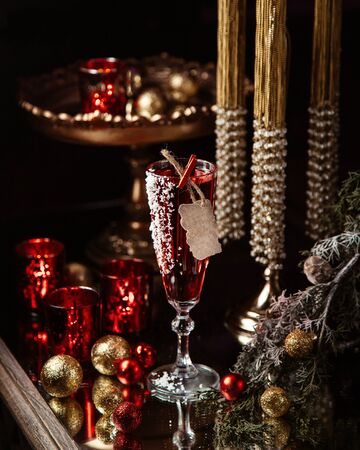 a glass of juice with new year toysの写真素材