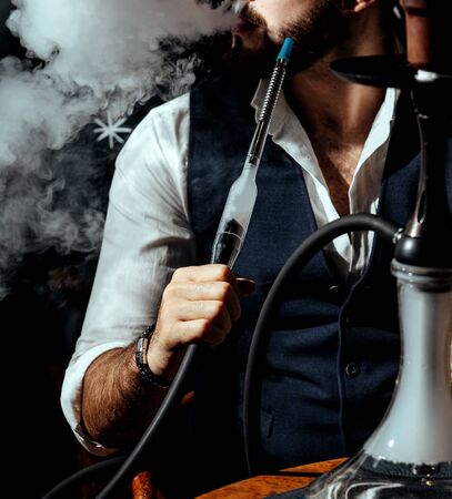 a person smoking hookahの写真素材