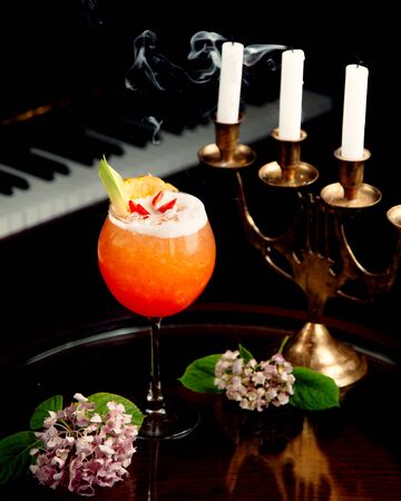 orange juice cocktail on the tableの写真素材
