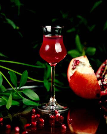 pomegranate juice on the tableの写真素材