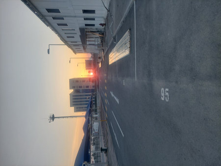 Aerial view of road in the city with sunlight.の写真素材