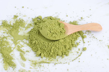 green powder isolated on white background