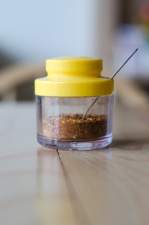 Cayenne pepper in  bottleの写真素材