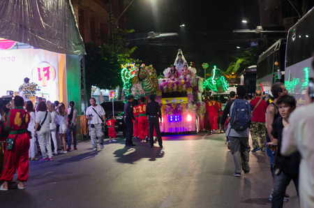 Bangkok, Thailand - September 14, 2015: Unidentified people and dragon dance celebrating Vegetarian ...
