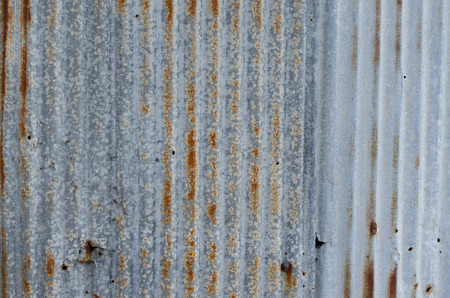 Old damage rusty zinc plat wallの写真素材