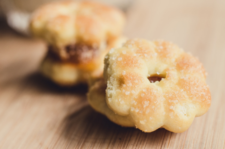 sugar crackers biscuit on wooden platesの写真素材