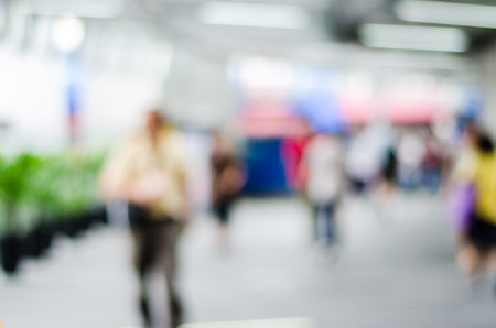 people in motion blur at the skytrain stationの写真素材