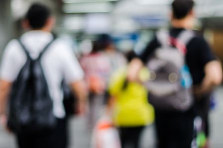 people in motion blur at the skytrain stationの写真素材