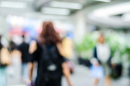 people in motion blur at the skytrain stationの写真素材