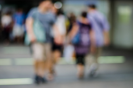 people in motion blur at the skytrain stationの写真素材