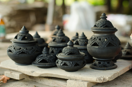 Artisan hands making clay pot