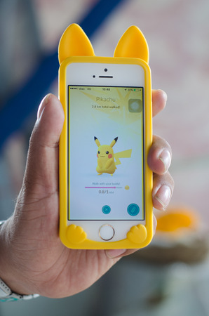 BANGKOK,THAILAND-September 29, 2016 : Pokemon Go,most popular new online game application smartphone, a free-to-play reality mobile game developed by Niantic for iOS and Android devicesのeditorial素材