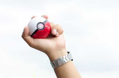 BANGKOK,THAILAND-September 29, 2016 : Pokeball on white backgrond Pokeball is equipment to catch Pokemons in a mobile game Pokemon Go.のeditorial素材