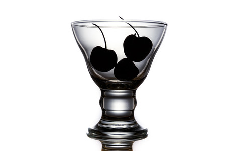 Silhouette cherry in the glassの写真素材