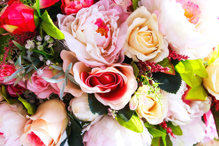 Colorful artificial flowers texture, backgroundの写真素材