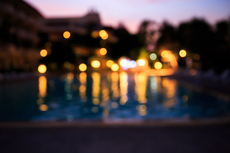 Blurred of party beside the swimming poolの写真素材