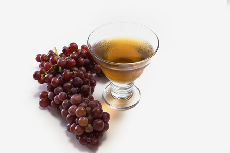Grapes and juice on white backgroundの写真素材